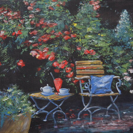 ein Tee vor dem Rosenstrauch